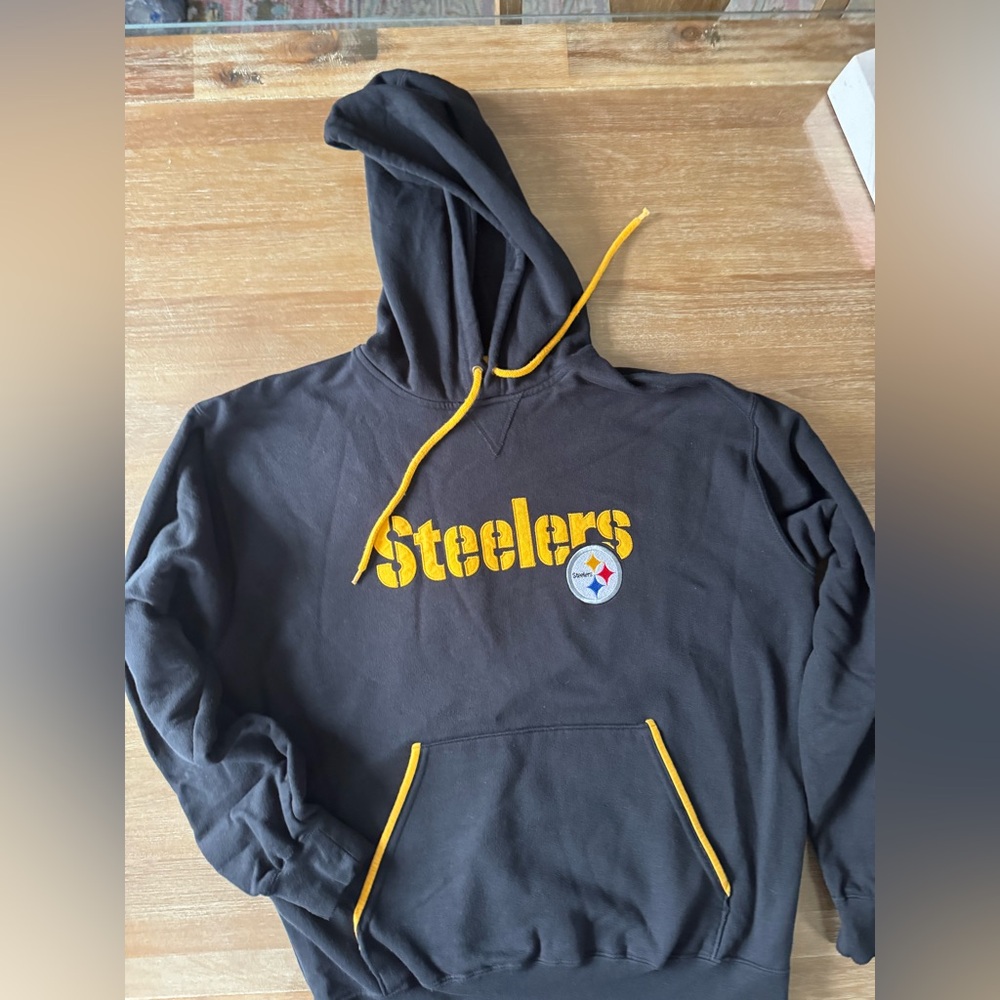 Barely worn men’s Pittsburgh Steelers black  hoodie size medium